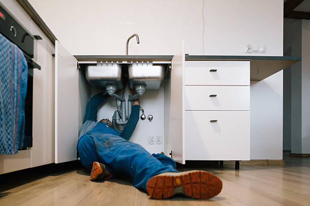 Professional Emergency Plumber technician working in Ellsworth, KS